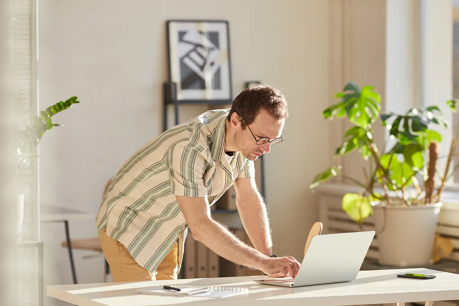 A person using a laptop to build quality backlinks for a tech company
